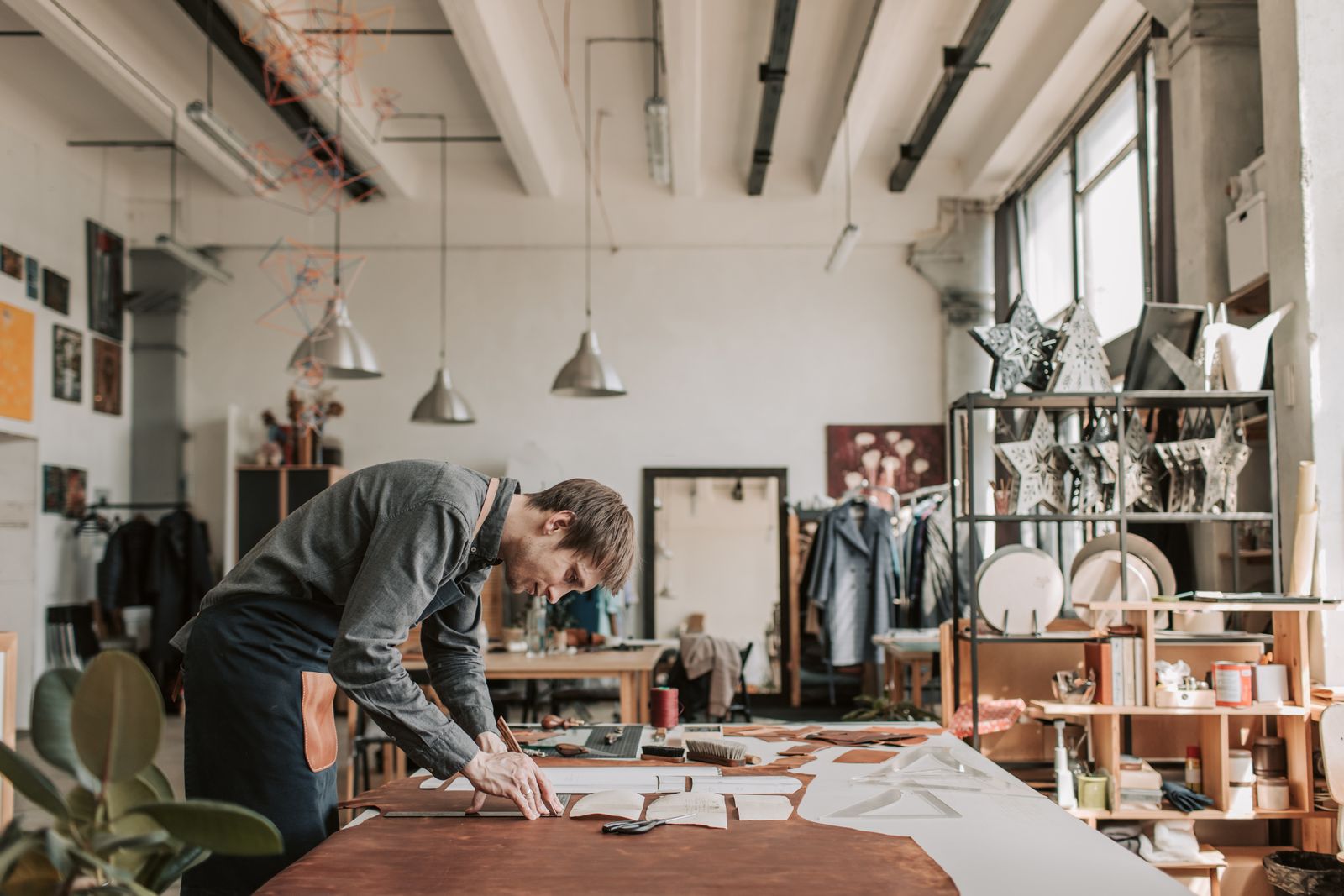 Artisan working in a bright workshop